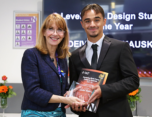 Deividas Bukauskas receives award from Principal of Havering Sixth Form College Janet Smith