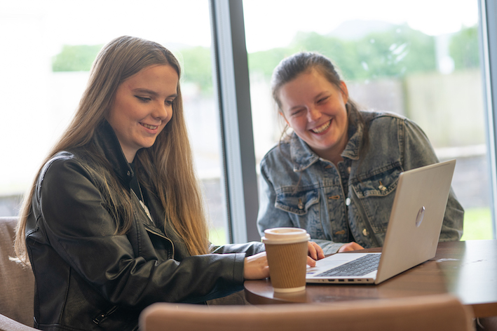 students using laptop