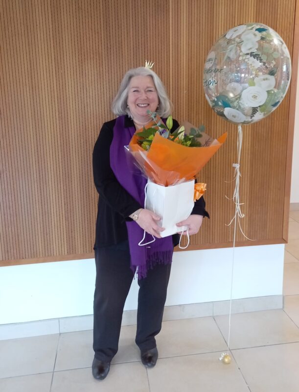 Stephanie pictured with flowers