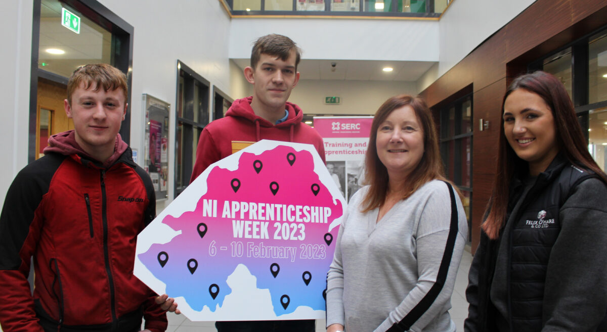 Apprentices pictured in College holding map of NI with NI Apprenticeship Week 2023