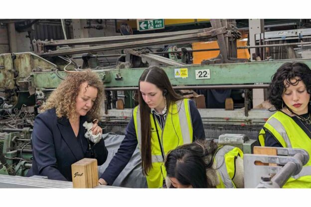 Andrea Noble, Design and Product Development Manager, with MMU students in Weaving Department