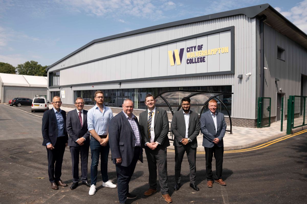 City partners standing outside the new Advanced Technology and Automotive centre at the Wellington Road campus