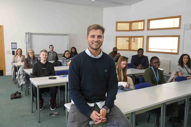 Man infront of class