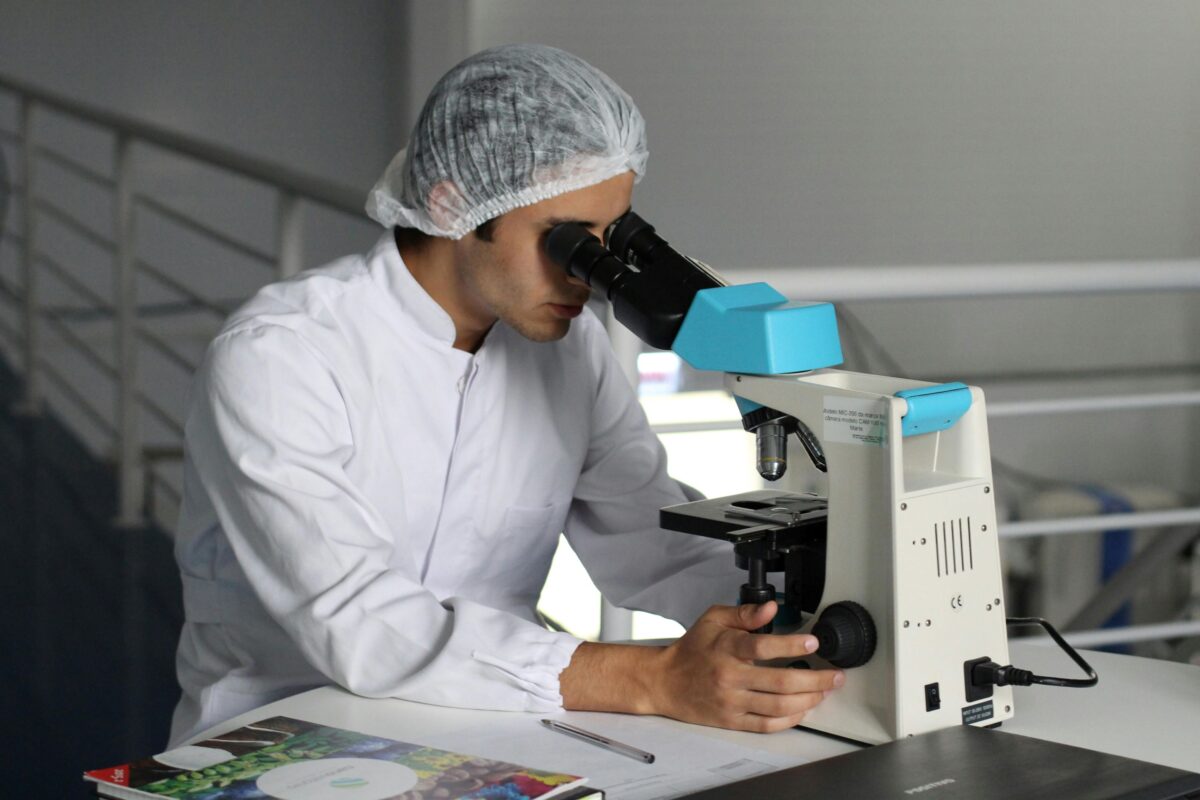 stock man using Microscope