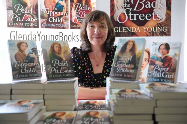 Glenda Young with her books