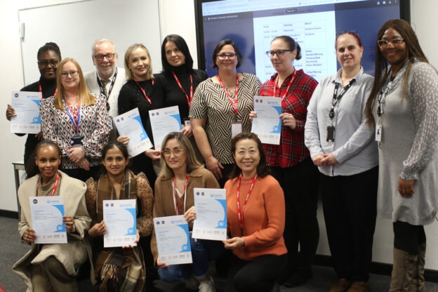 Graduates are all smiles after receiving certificates